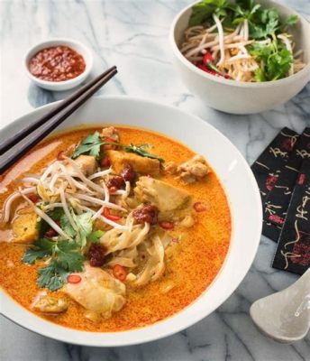  Laksa Sarawak: Một món ăn lấp lánh hương vị với nước cốt dừa béo ngậy và sự cay nồng của ớt!