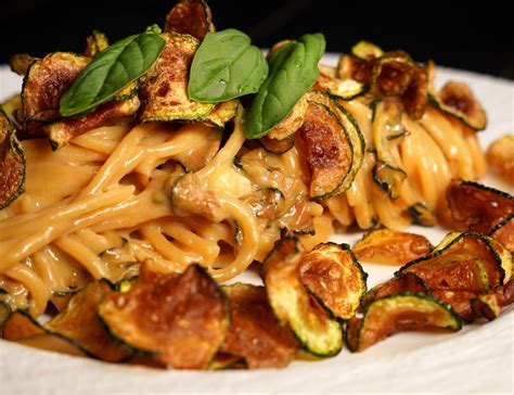  Spaghetti alla Nerano: The Creamy Dreaminess of Fried Zucchini Meets the Brilliance of Melted Provolone Cheese!